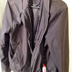 Jacket zwart, as reported by Qbuzz DMG using iLost