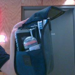 Toilet bag black, grey, as reported by MEININGER Hotel Innsbruck Zentrum using iLost