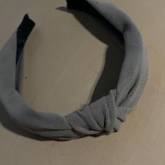 Banda per al cap Beige, segons ha informat Jaarbeurs mitjançant iLost