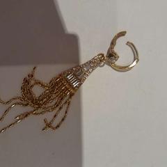 Ohrring couleur or, gemeldet von TCL über iLost