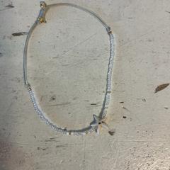 Pulseira, segundo informou Artis usando iLost