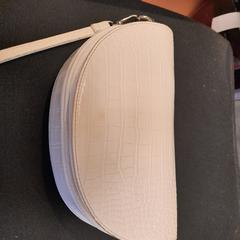 Saco de pano blanc, como reportado por TCL utilizando o iLost