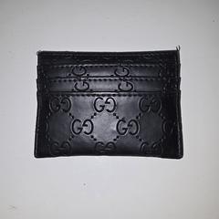 Kleine zwarte portemonnee, segundo informou a iLost