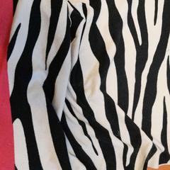 Strandlaken noire blanche et rose, zoals gemeld door TCL met iLost