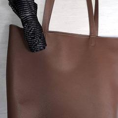 Bag bruin, as reported by Qbuzz DMG using iLost