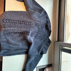 Maglione, come riportato da Madurodam utilizzando iLost