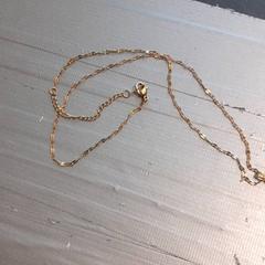 Ketting met bedel Goudkleur, zoals gemeld door Qbuzz servicepunt  Emmen met iLost