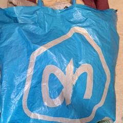 Tasje kleding, rapporterat av Qbuzz DMG med iLost