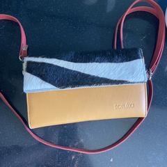 Orange purse، كما تم الإبلاغ عنه عبر iLost