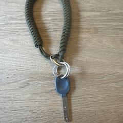 Sleutel met groen koord, som rapporterats till iLost