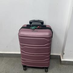Wheeled suitcase وردي, as reported by محطة بريدة (بريدة) using iLost