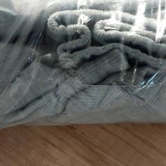 Saco Met kledij, como reportado por Centraal magazijn utilizando o iLost