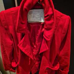 Casaco red, como reportado por The Dominican utilizando o iLost