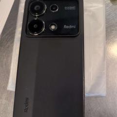 Redmi black, zoals gemeld door MEININGER Hotel Bruxelles Gare du Midi met iLost