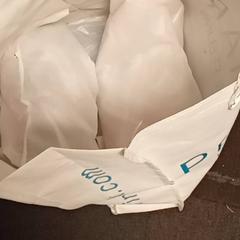 Bolsa With paar of shoe's, segundo informou Mövenpick Hotel Amsterdam City Centre usando iLost