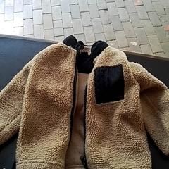 Vest fleece Bruin, rapporterat av Apenheul med iLost