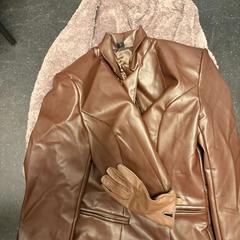 İLost kullanarak Ramada by Wyndham Amsterdam Airport Schiphol tarafından bildirildiği gibi Dış giyim