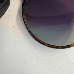 Gafas de sol, segundo informou Liquicity Festival usando iLost