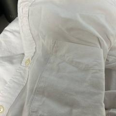 Camicia, come riportato da Sheraton Brussels Airport Hotel utilizzando iLost
