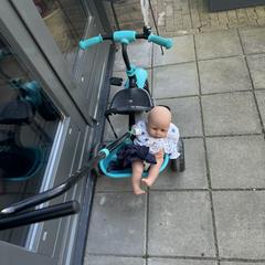 Kinderdriewieler met baby born pop, iLost-i jakinarazi zaion moduan