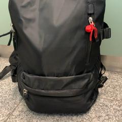 Backpack Zwart, as reported by Eindhoven Airport using iLost