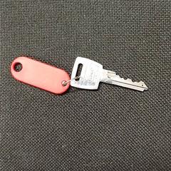 Nyckel Rode sleutelhanger, rapporterat av Qbuzz GD Groningen Peizerweg med iLost