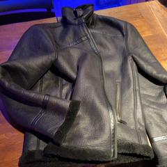 Jacket Black faux leather, as reported by Club Nyx/Exit Café using iLost