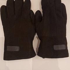 Guanti Donker bruin, come riportato da Van der Valk Hotel Schiphol utilizzando iLost