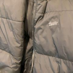 Jacket zwart dons, as reported by Eindhoven Airport using iLost