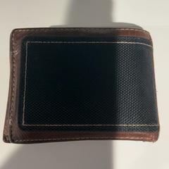Bag Carhartt, brown leather wallet, as reported by Cincinnati Tennis LLC using iLost