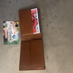 Bruine portemonnee, som rapportert til iLost