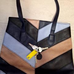 Kabelka Sido, jak nahlášeno Qbuzz DMG pomocí iLost