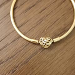 Pandora goud hartje armband, iLost'a bildirildiği gibi