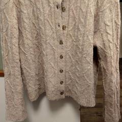 Maglione, come riportato da Inntel Hotels Amsterdam Centre utilizzando iLost