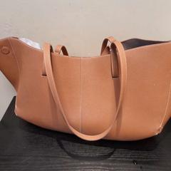 Sac marron, a été signalé par TCL utilisant iLost