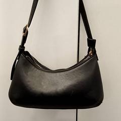 Borsa zwart, come riportato da Qbuzz GD Groningen HS utilizzando iLost