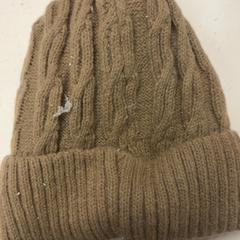 Beanie, como reportado por Het Amsterdamse Winterparadijs utilizando o iLost