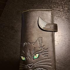 Portemonnee, som rapporterats till iLost