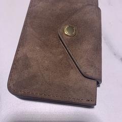 Bruine portemonnee, som rapportert til iLost