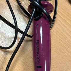 Electric hair comb purple and black, zoals gemeld door Sheraton Brussels Airport Hotel met iLost