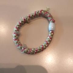 Braccialetto Touw, come riportato da LUMC utilizzando iLost