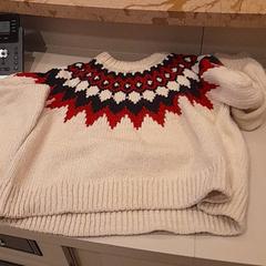 Trui Beige rood, zoals gemeld door Van der Valk Hotel Schiphol met iLost