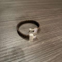 Polsera zwart / silver, segons ha informat Hotel Apeldoorn mitjançant iLost