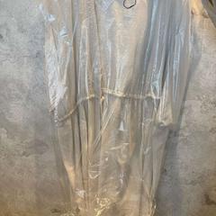 Kleding witte lange vest, rapporterat av Van der Valk Hotel Amsterdam-Amstel med iLost