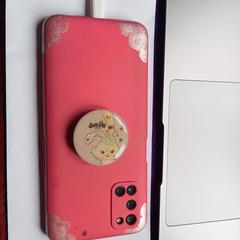 Oppo mobile phone with a red cover, iLost-i jakinarazi zaion moduan