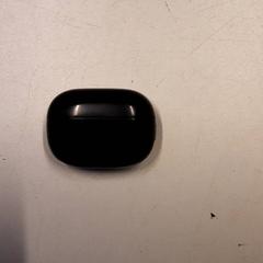 Porta auricolare zwart, come riportato da Qbuzz ZHN utilizzando iLost