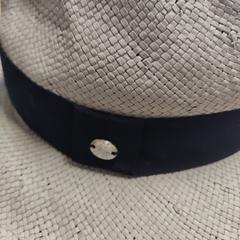 Hat Grey, as reported by The Dominican using iLost