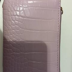 Carteira, como reportado por allGo Almere utilizando o iLost