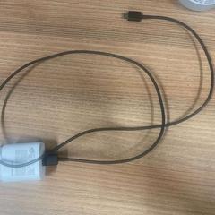 Cargador black cable, white head, ha sido reportado por Vrije Universiteit Brussel (VUB) con iLost