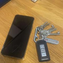 Mobiltelefon groen + sleutelbos Alcatel, rapporterat av Gemeente Hardenberg med iLost